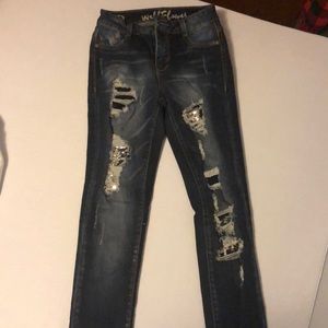 Size 0 skinny jeans with Blue and silver sequins.